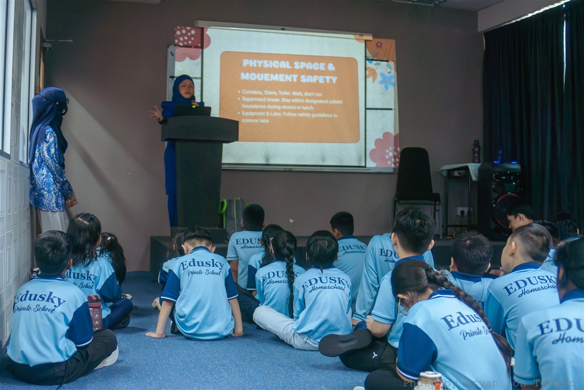 Students learning fire safety procedures at Edusky Private School