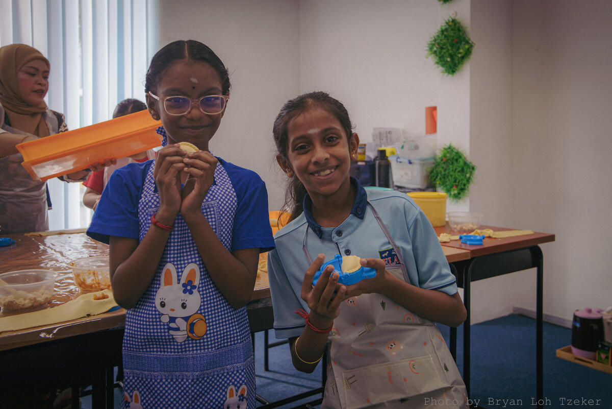 Pupils plating Malaysian favourites for Merdeka