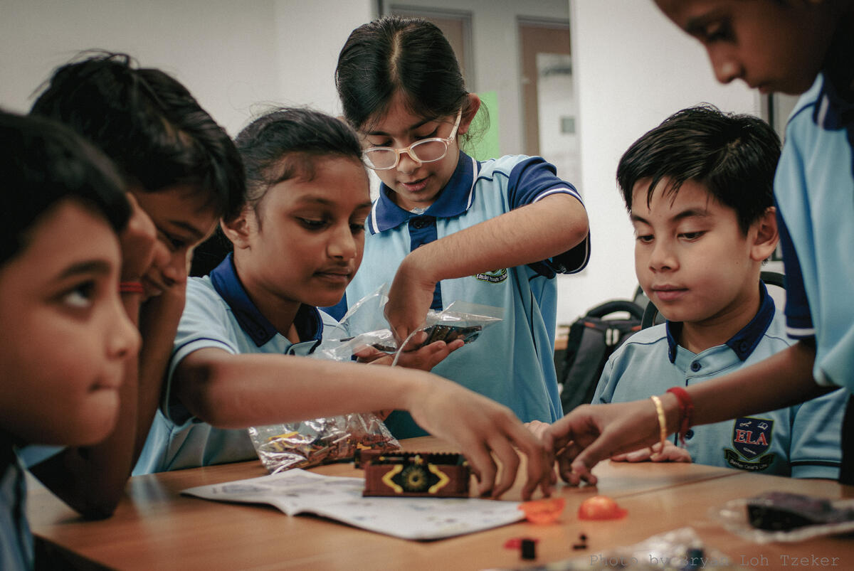 Year 3 pupils sorting Lego pieces before building