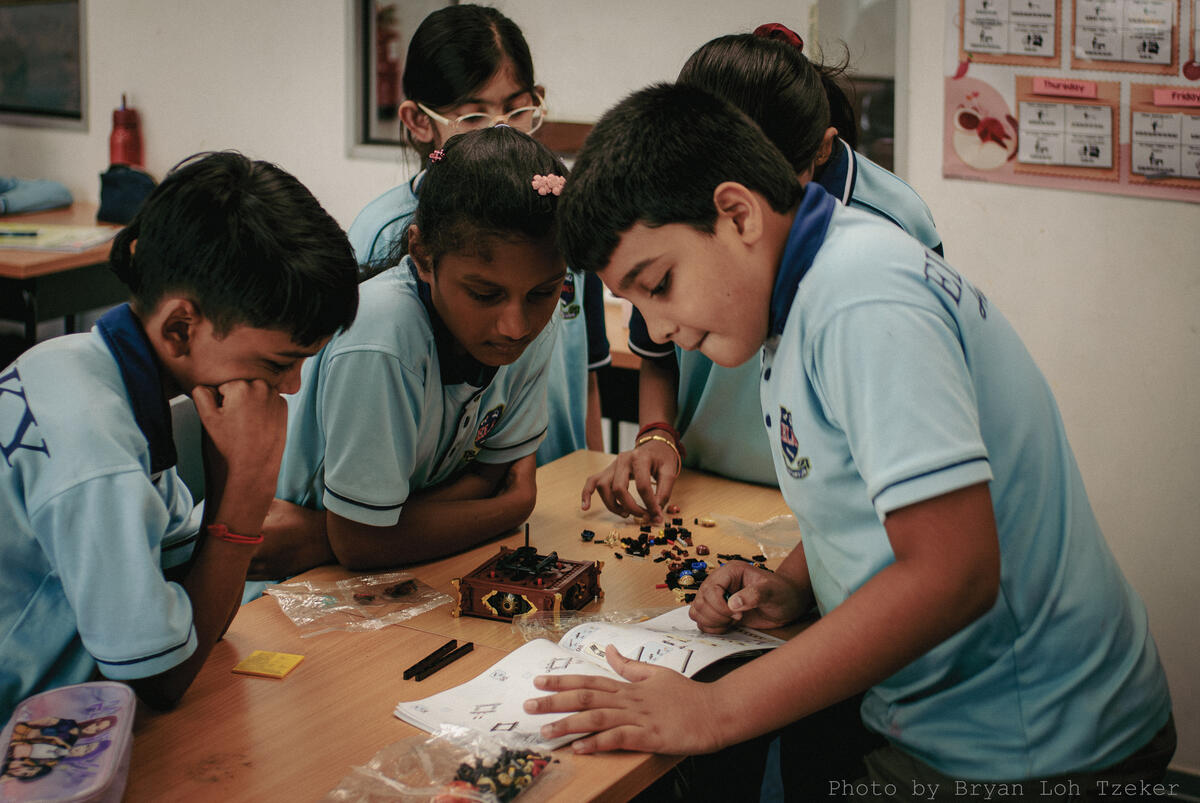 Year 3 team celebrating their completed Lego project